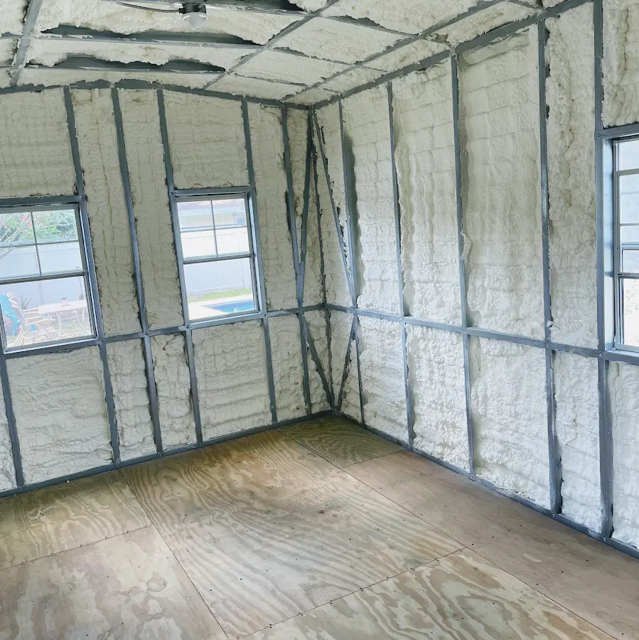 Closed-cell spray foam insulation applied to wall cavities in a residential project in Temple Hills